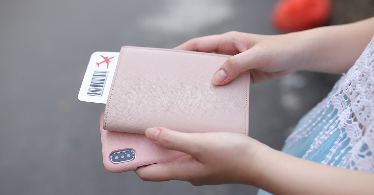 A boarding pass beside a phone