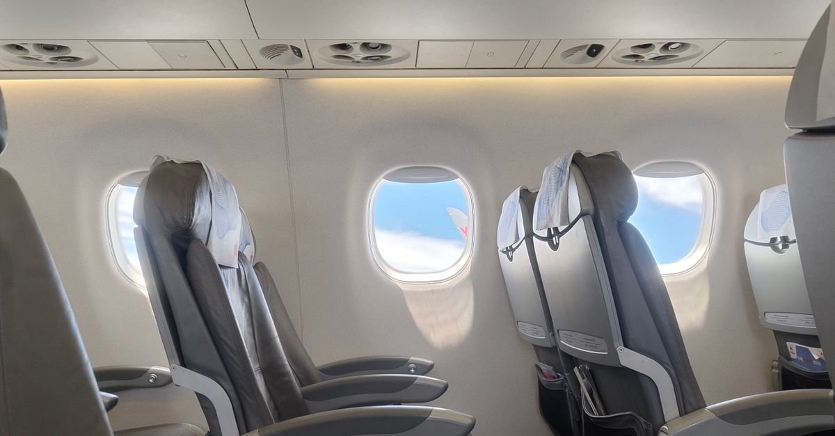 A view through an aircraft window from a window seat