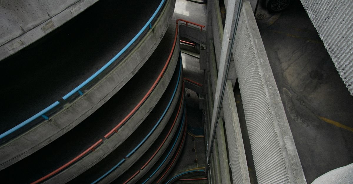 Cars parked on a level of an airport multi-storey car park