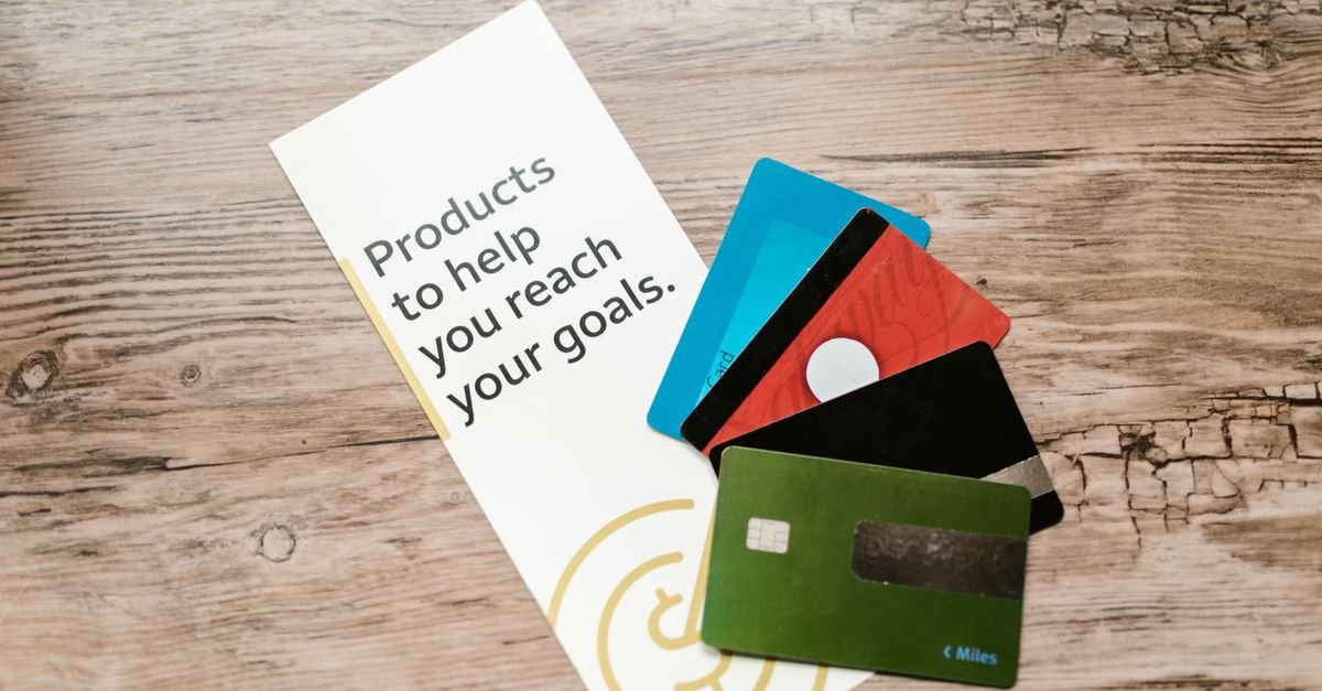 Several credit cards laid out on a table