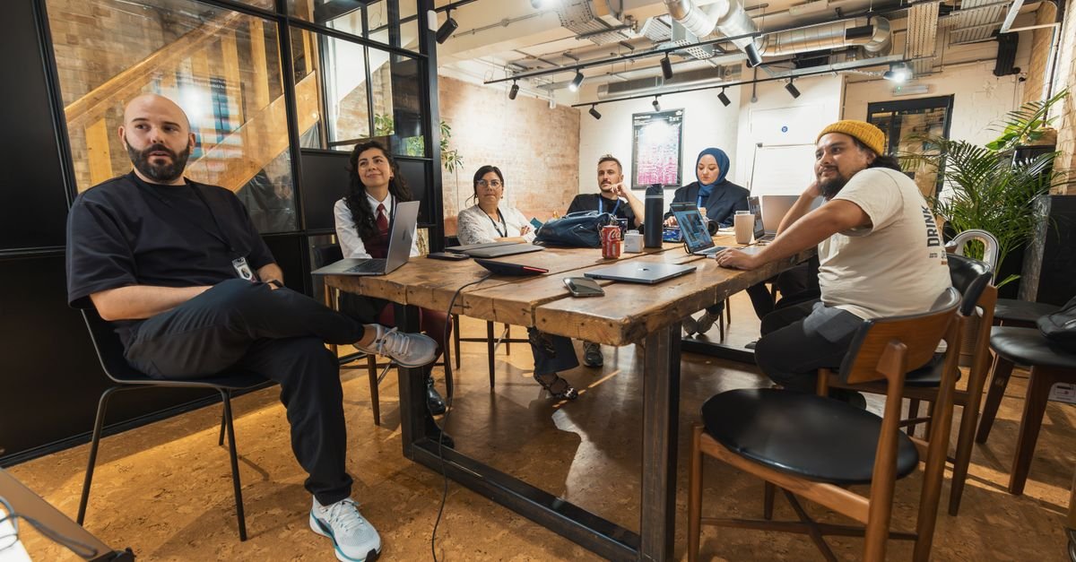 People planning a trip around a table