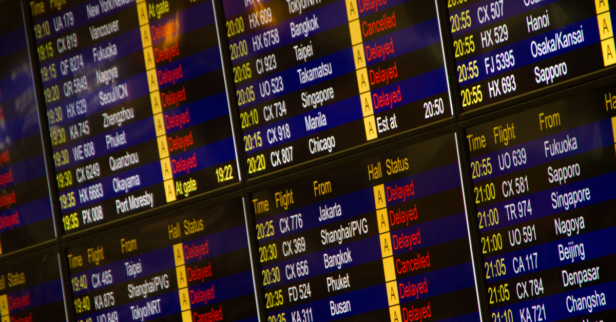 An airport departures screen listing destinations