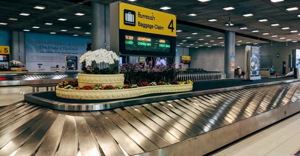 Luggage moving along an airport baggage carousel